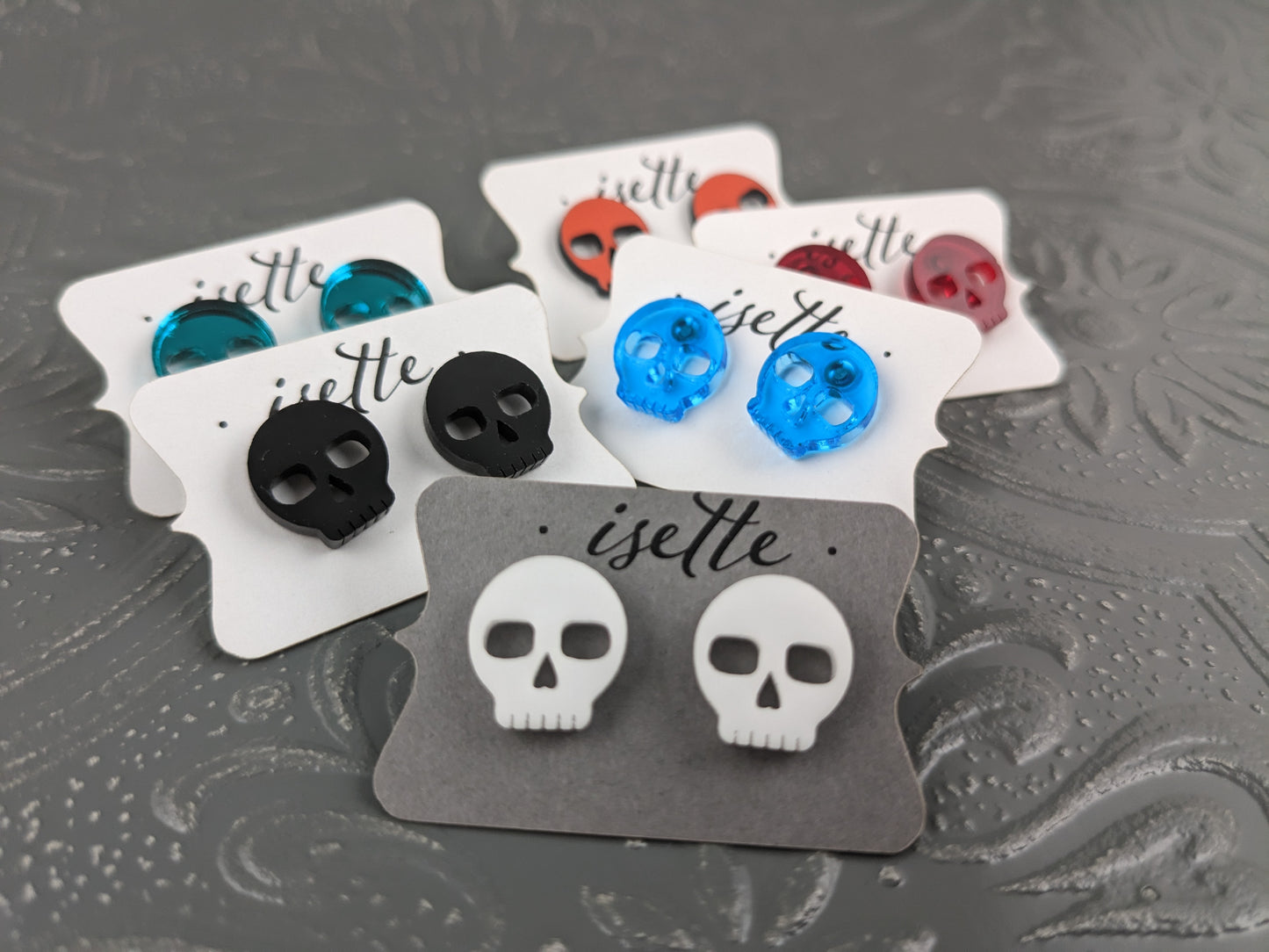 Skulls Studs, Transparent Blue