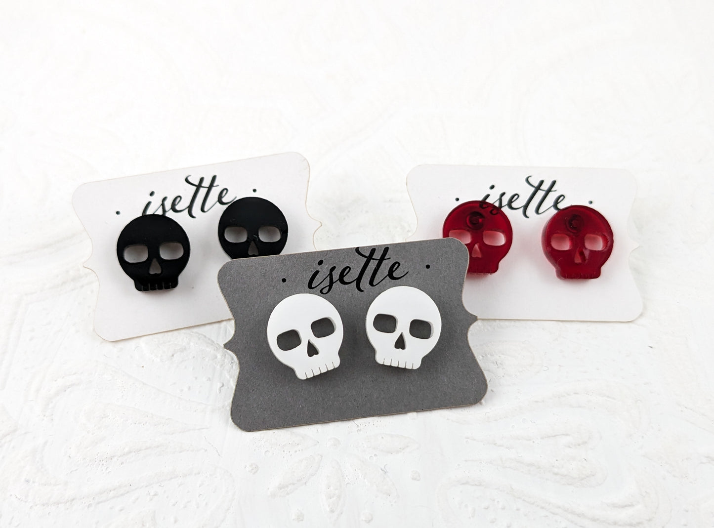 Skulls Studs, Transparent Red