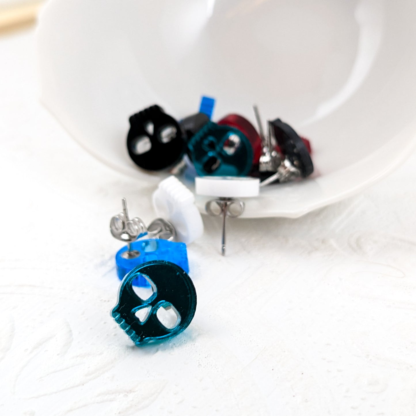 Skulls Studs, Teal Mirror