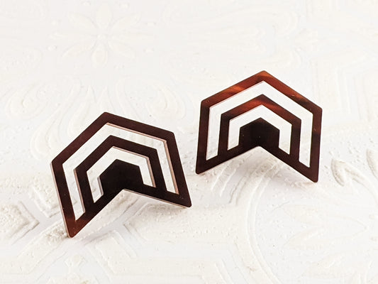 Warm translucent brown and gold tortoiseshell acrylic cut into Irregular Radiating Hexagon Earrings by Isette